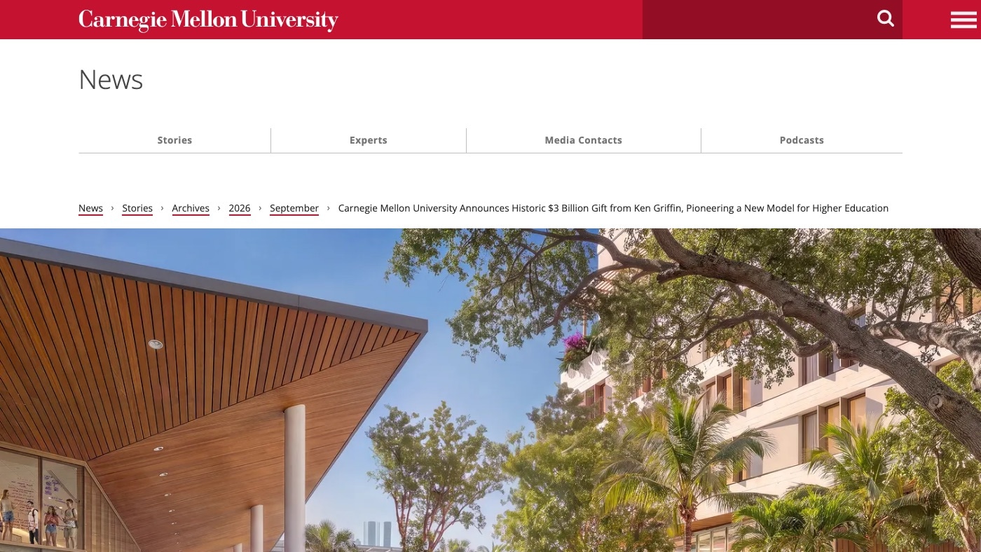 A news story at desktop width. The News header and section tabs, a breadcrumb trail that ends in the story title, and a full-width photograph of a landscaped campus courtyard under a wooden canopy.